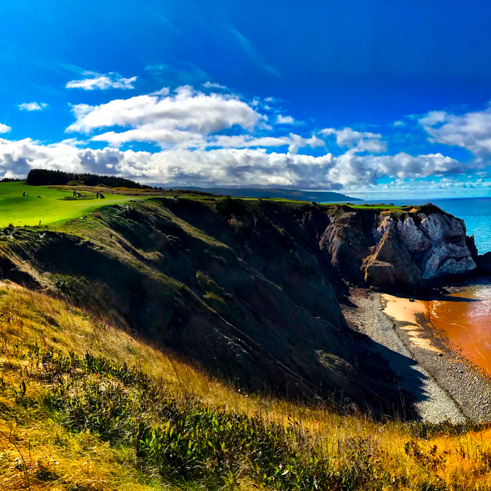 A links hole along the Gulf shore